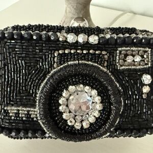 Viral beaded camera bag with chain strap